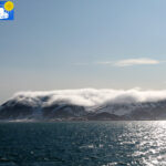 Clouds on the mountains towards Madgalenefjorden