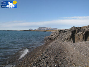 Rock beach towards Kapp Guissez